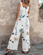 Damen Trägerkleid Lena – Schwarz mit Gänseblümchen, Locker & Bequem