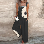 Damen Trägerkleid Lena – Schwarz mit Gänseblümchen, Locker & Bequem