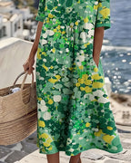Damenkleid Midi Lina – florales Muster, locker fließender Schnitt