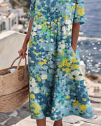 Damenkleid Midi Lina – florales Muster, locker fließender Schnitt